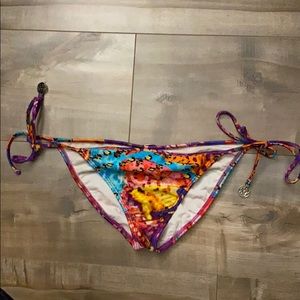 LULI FAMA: Wavey Ruched Back Tie Side Bottom